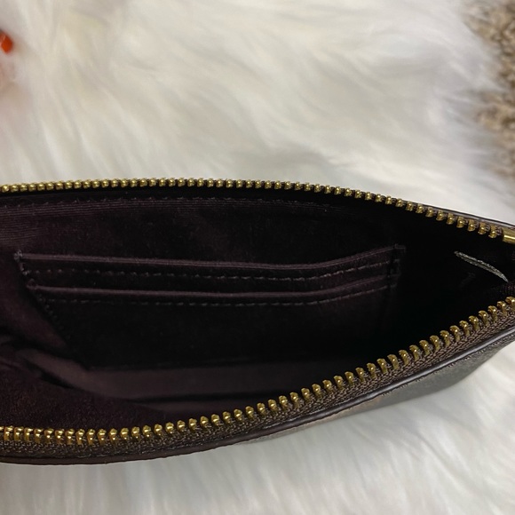 Coach Bags Coach Corner Zip Wristlet In Signature Canvas Hedgehog